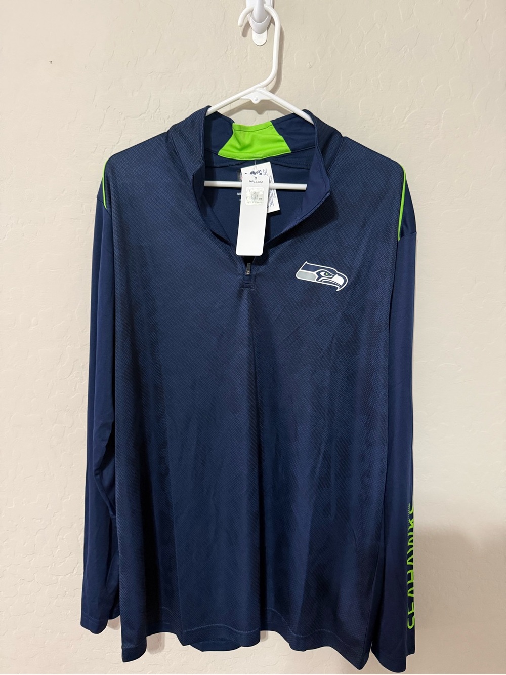 Seattle Seahawks Men's Navy Long Sleeve Quarter-Zip Performance Tee
